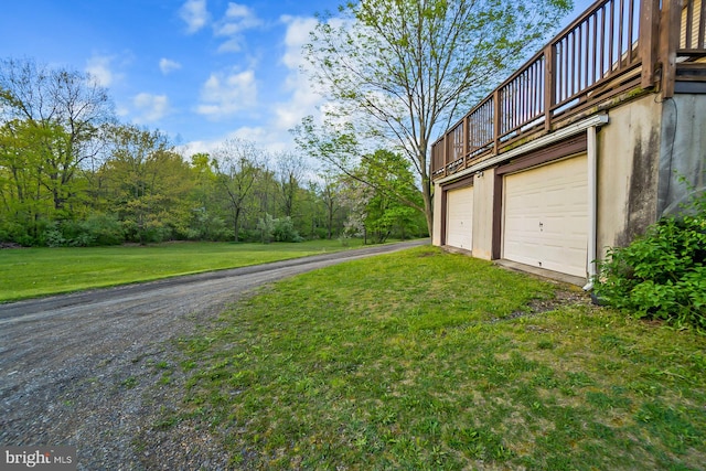 view of yard with a garage