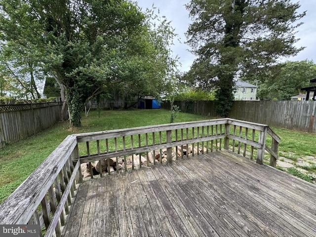 deck featuring a yard