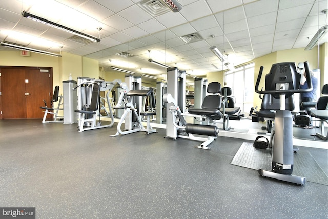 gym with a drop ceiling