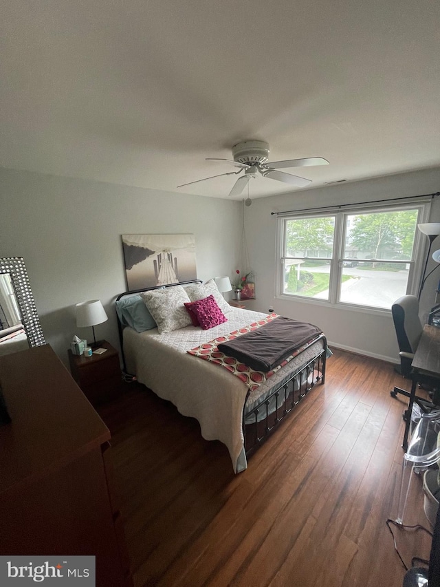 bedroom featuring ceiling fan and hardwood / wood-style floors