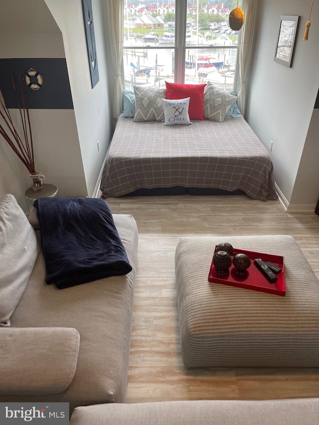 bedroom featuring light wood-type flooring