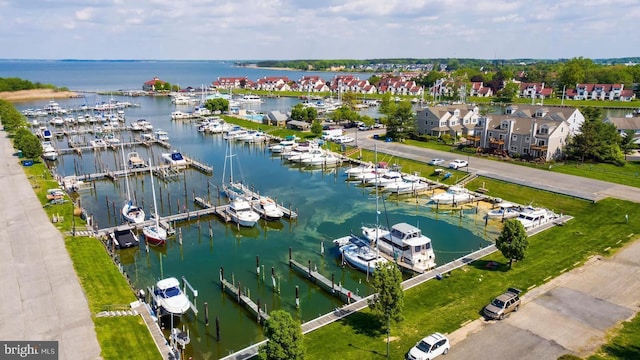 birds eye view of property featuring a water view