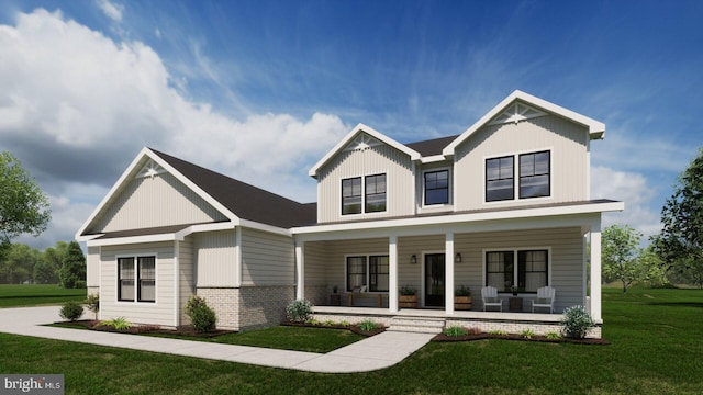 craftsman inspired home featuring covered porch and a front lawn