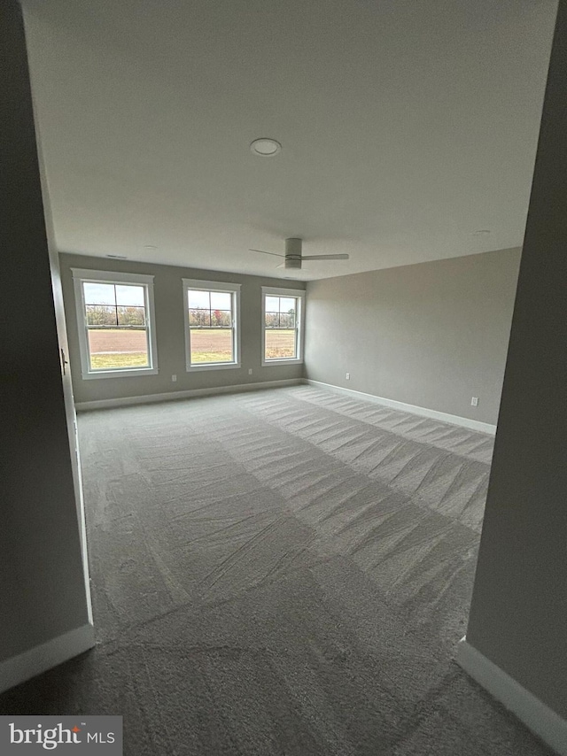 22430 Hummingbird Rd, Ellendale, DE 19941 - spare room with baseboards, carpet flooring, a ceiling fan, and recessed lighting
