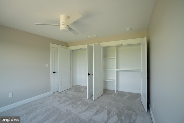 22430 Hummingbird Rd, Ellendale, DE 19941 - unfurnished bedroom featuring a ceiling fan, baseboards, carpet, and a closet