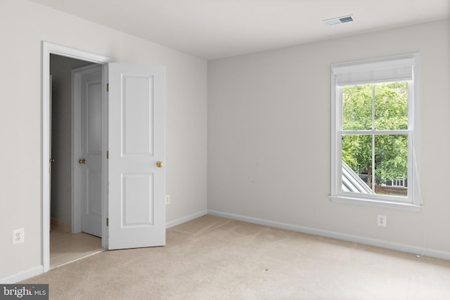 view of carpeted spare room