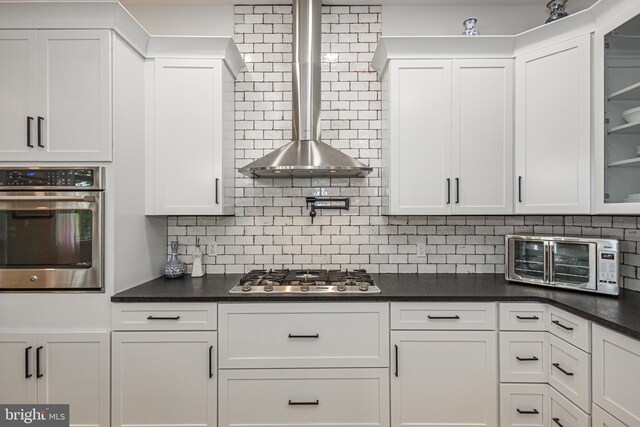 kitchen featuring white cabinetry and stainless steel appliances