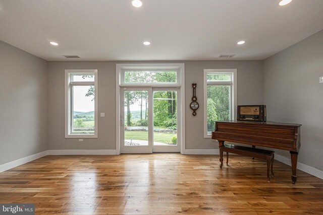 doorway to outside featuring hardwood / wood-style flooring