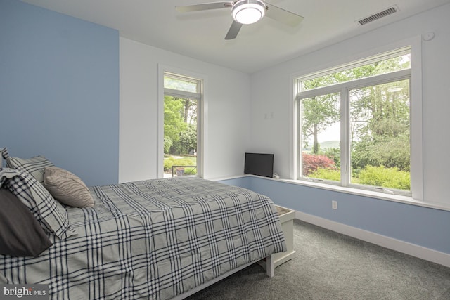 carpeted bedroom with ceiling fan