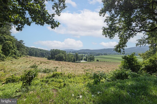 view of mountain feature featuring a rural view