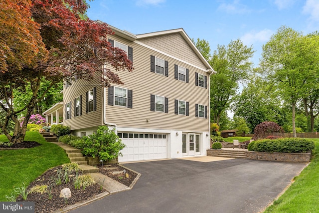 view of property exterior featuring a garage