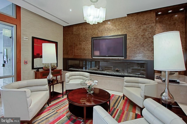 living room with an inviting chandelier