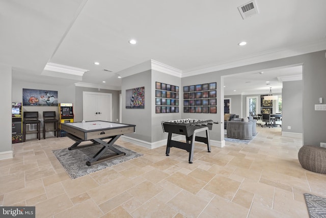 game room featuring ornamental molding and light tile floors