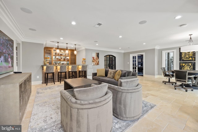 living room with bar area, built in features, and light tile floors