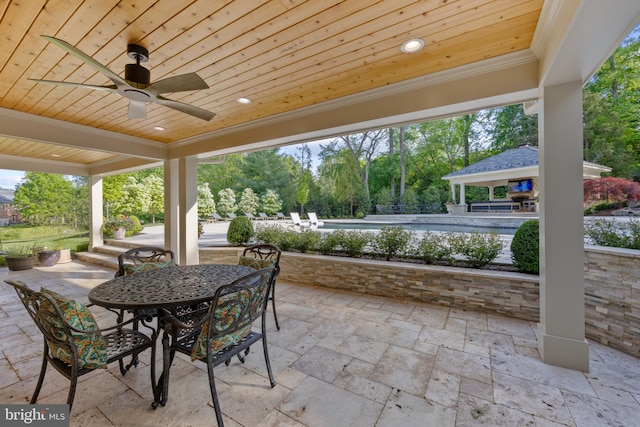 view of patio with ceiling fan and a gazebo