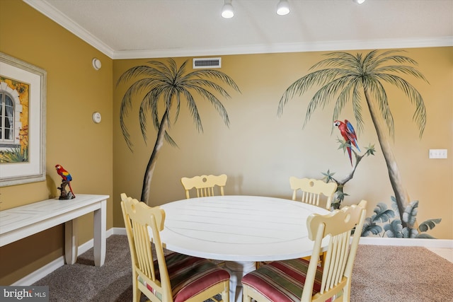 dining space featuring carpet flooring and crown molding