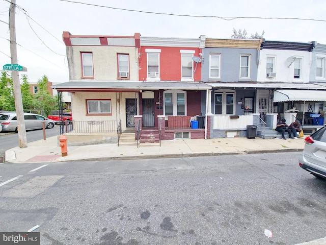 view of property with a porch