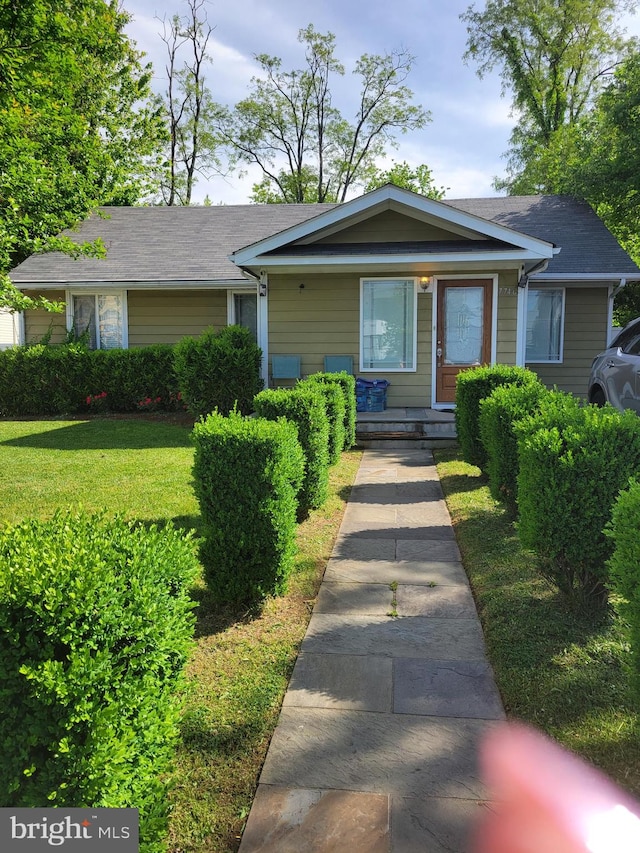 view of front of house with a front yard