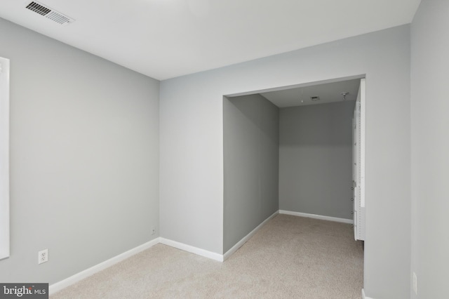 spare room with carpet floors