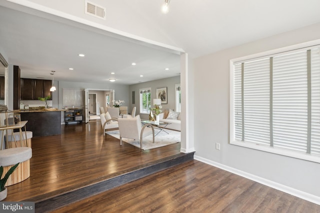 unfurnished dining area featuring hardwood / wood-style floors