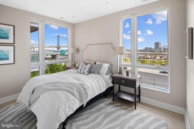 bedroom with wood-type flooring