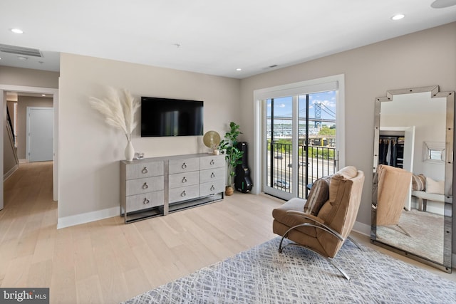 living area with wood-type flooring