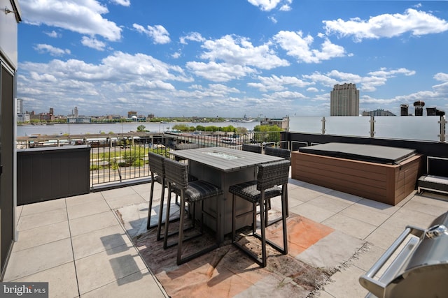 view of patio / terrace featuring a water view