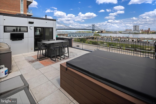 view of patio with a hot tub