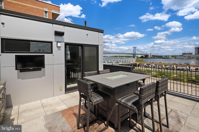 view of patio / terrace with a water view