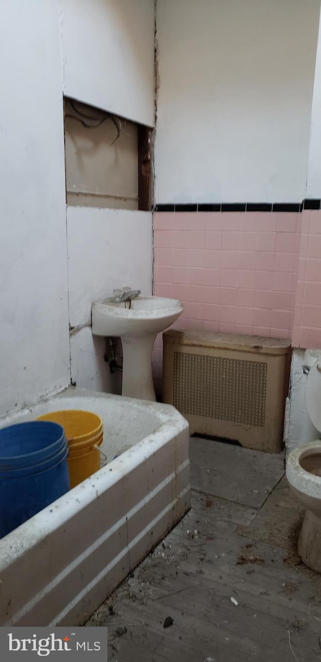 bathroom featuring toilet