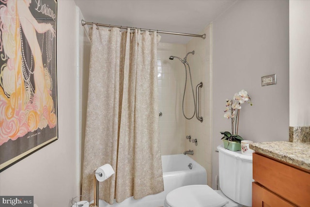 full bathroom featuring toilet, vanity, and shower / tub combo with curtain