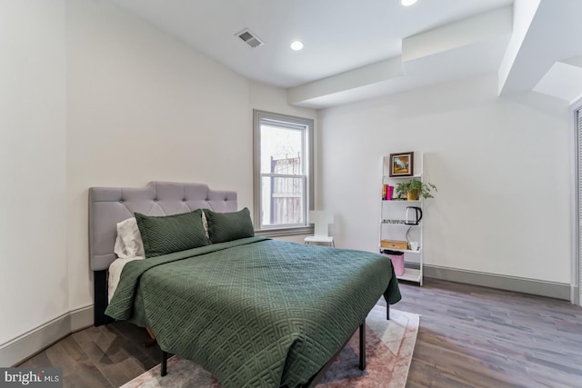 bedroom featuring hardwood / wood-style flooring