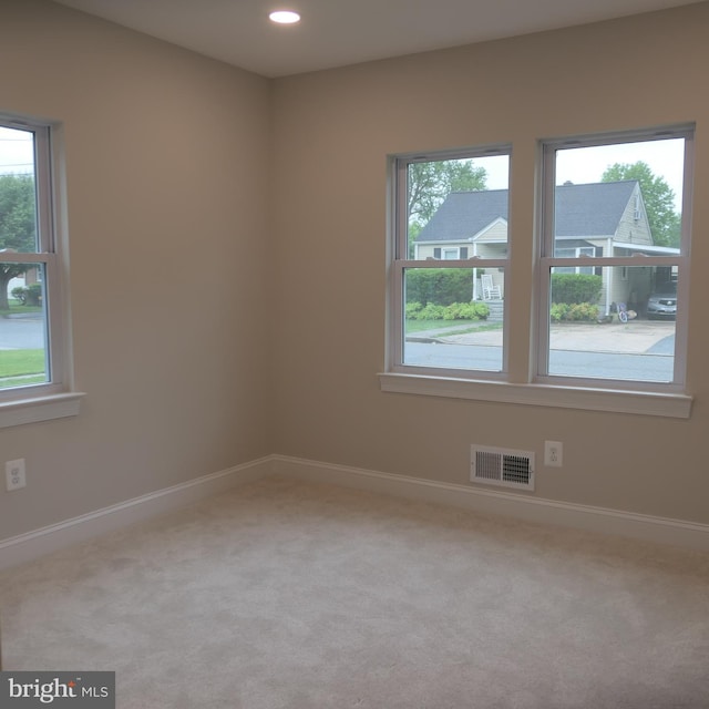 view of carpeted spare room