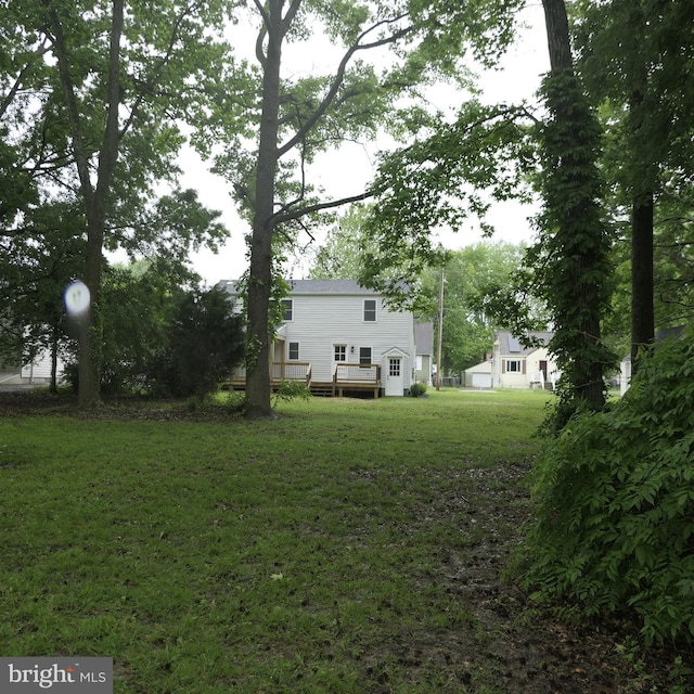 view of yard featuring a deck