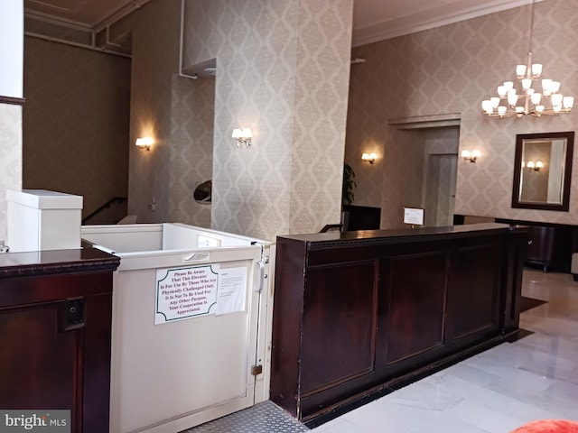 reception area featuring a notable chandelier