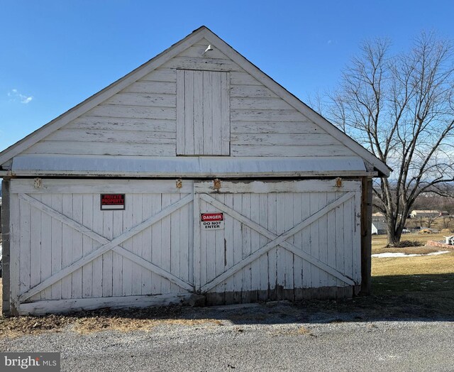 rear view of house with a yard