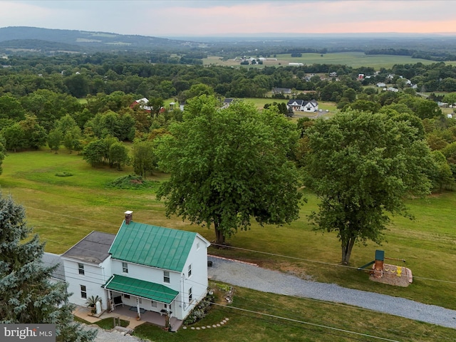 aerial view at dusk with a rural view