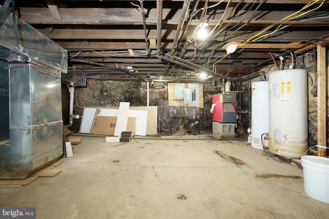 basement with water heater and gas water heater