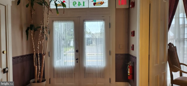 entryway featuring french doors