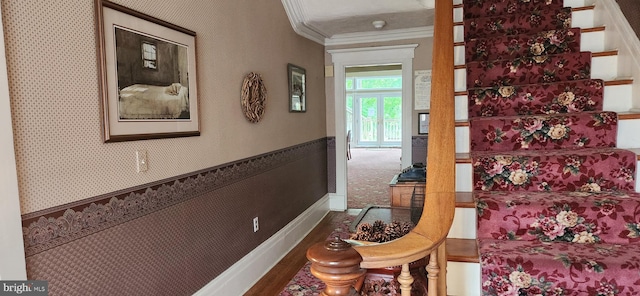 corridor featuring carpet and crown molding