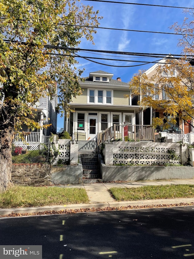 view of front of property featuring covered porch