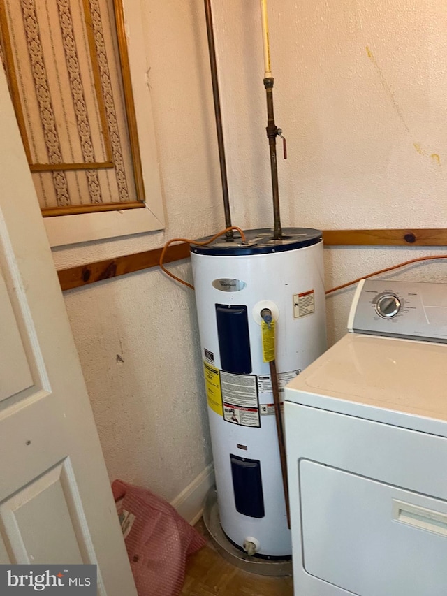 utilities featuring washer / clothes dryer and electric water heater