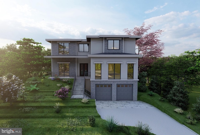 view of front of property with a garage and a front lawn