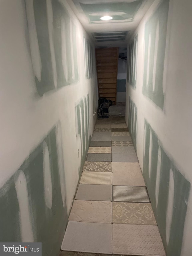 corridor featuring light tile flooring