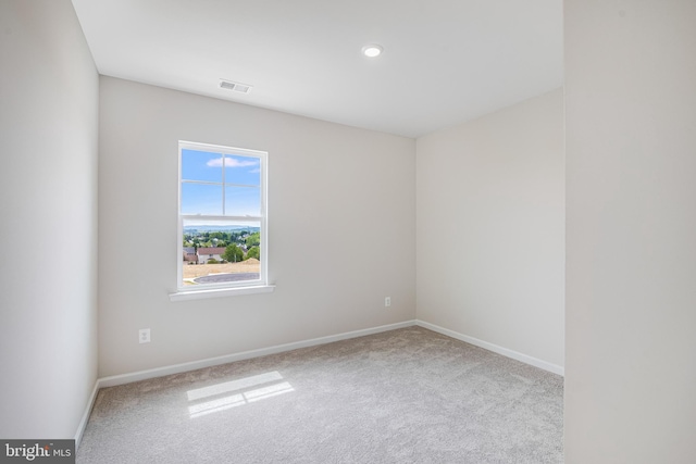 empty room featuring carpet flooring