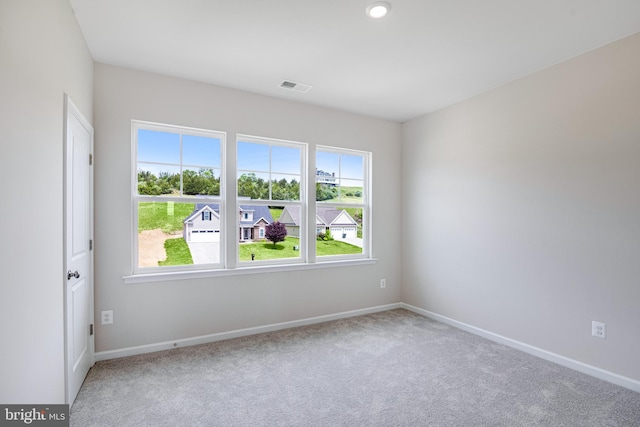 spare room with carpet floors