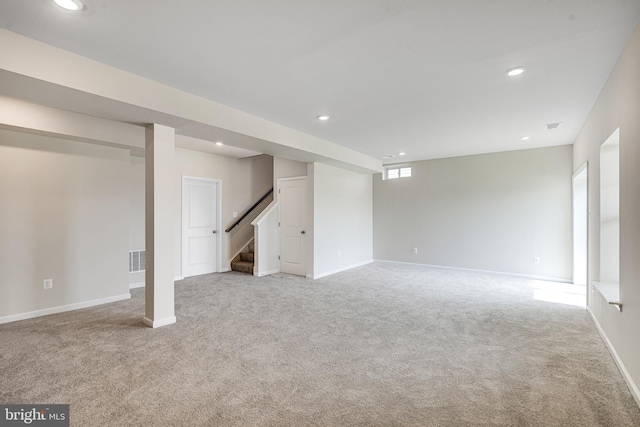 basement featuring carpet