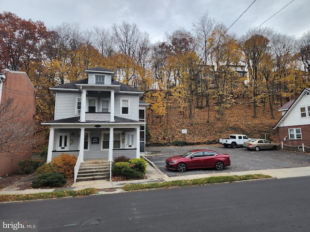 front of property featuring covered porch