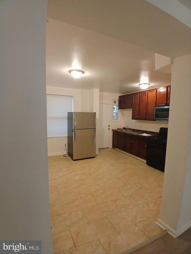 kitchen with sink and stainless steel appliances