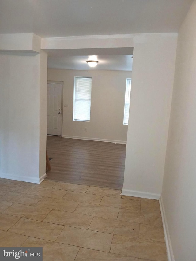 unfurnished room featuring light hardwood / wood-style floors